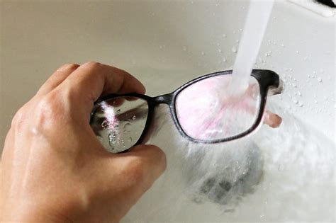 Is it bad to put water on your glasses?