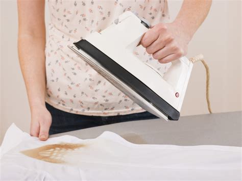 Is it bad to touch water after ironing?