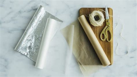 Is it better to bake with foil or parchment paper?