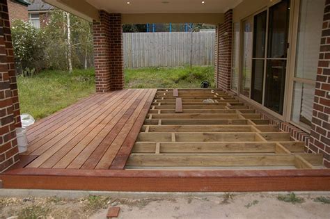 Is it better to build a deck over a concrete patio?