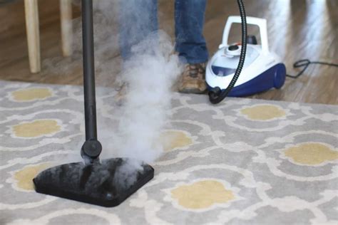 Is it better to clean carpet with hot water or steam?