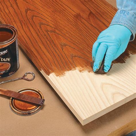 Is it better to oil or stain wood?