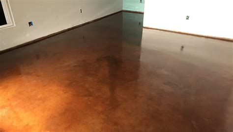 Is it better to paint or stain concrete?