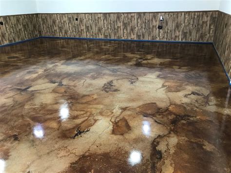 Is it better to stain or epoxy concrete?
