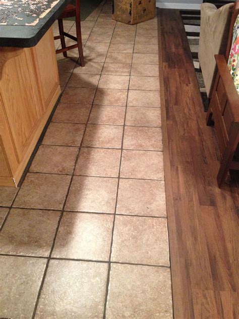 Is it cheaper to do tile or laminate?