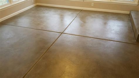 Is it cheaper to tile or stained concrete?