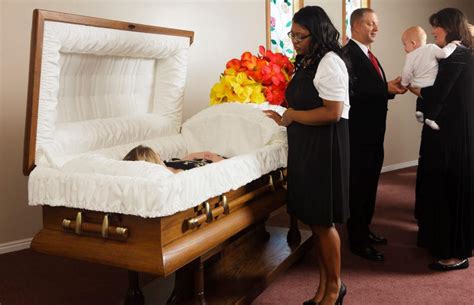 Is it disrespectful to take a picture of an open casket?