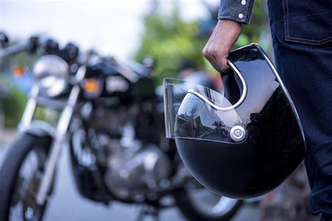 Is it illegal to ride a motorcycle without a helmet in Maine?