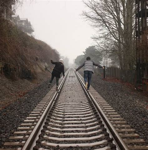 Is it illegal to walk on train tracks in Michigan?