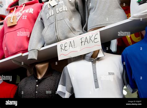 Is it illegal to wear fake brands in UK?