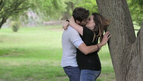 Is it normal to kiss in public in Canada?