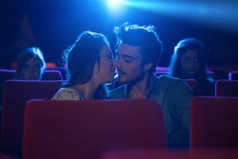 Is it rude to kiss in a movie theater?