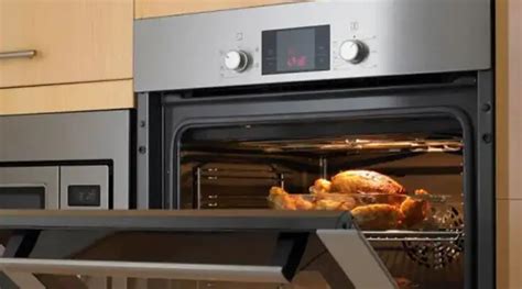 Is it safe to cook in a new oven?