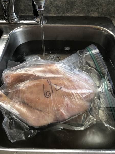 Is it safe to defrost chicken in water?