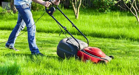 Is it safe to mow wet grass with electric mower?