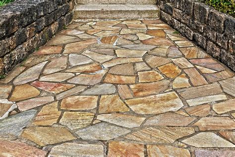 Is limestone cheaper than pavers?