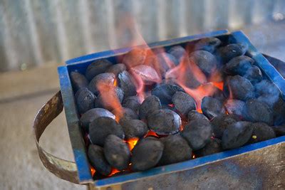 Is propane safer than charcoal?