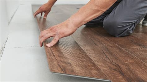 Is real wood flooring better than laminate?