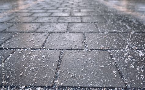 Is rock salt bad for asphalt?