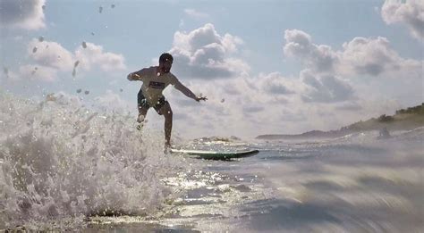Is surfing difficult for tall people?