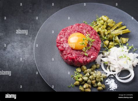 Is the egg in tartare raw?