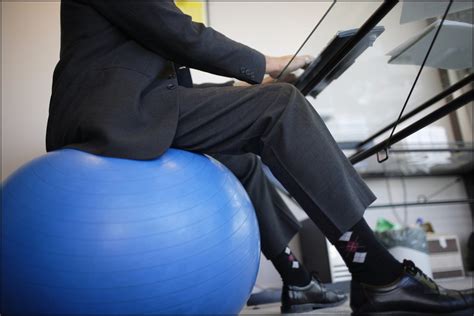 Is there a benefit to sitting on an exercise ball at work?