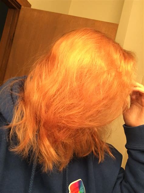 Should I bleach my hair again if it turned orange?
