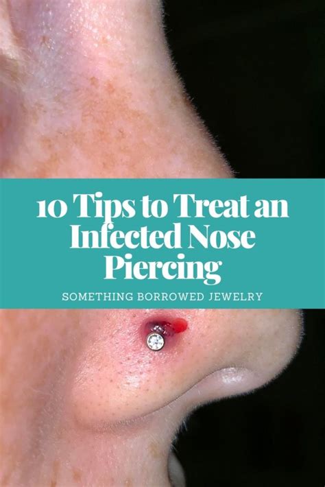 Should I clean dried blood off nose piercing?