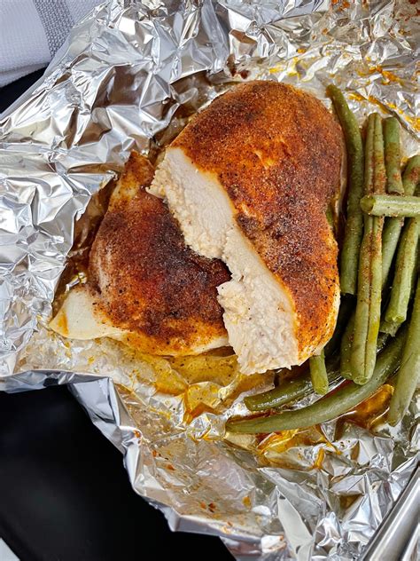 Should I cover whole chicken with foil when baking?