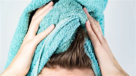 Should I dry my hair with a towel?