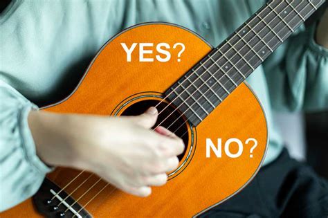 Should I learn guitar with a pick or fingers?