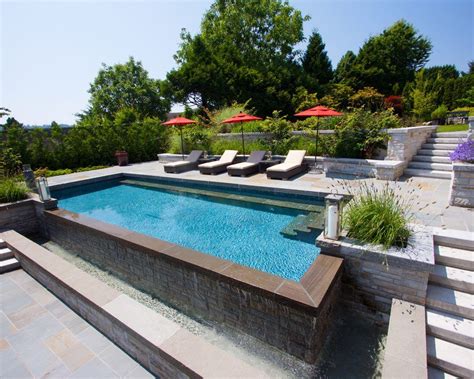 Should a pool deck be level or sloped?