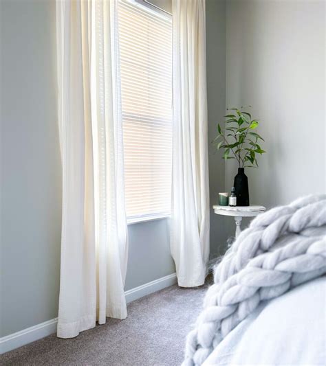 Should curtains touch the floor or be above?