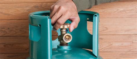 Should gas cylinders be inside or outside the house?