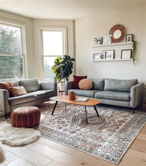 Should sofa cushions match rug?