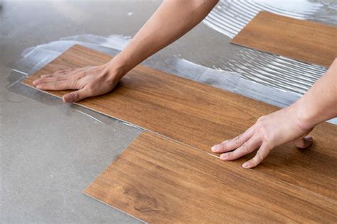 Should vinyl plank flooring be glued down?