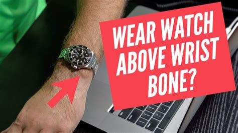 Should watch be above or below wrist bone?