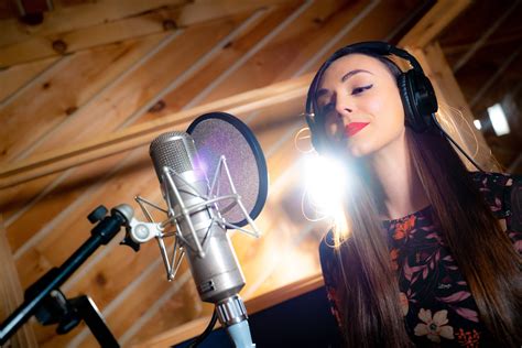 Should you record vocals with headphones on?