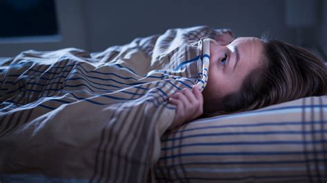 Should you wake a person who is having a nightmare?