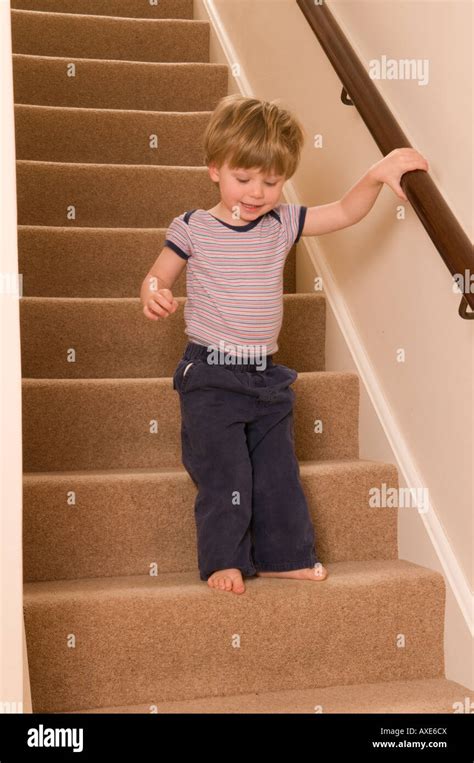 What age can baby go down stairs?