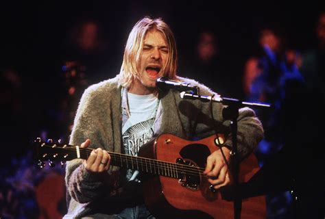 What age did Kurt Cobain learn guitar?