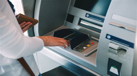 What are 2 services available through an ATM?