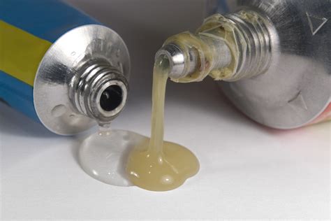 What are examples of organic adhesives?