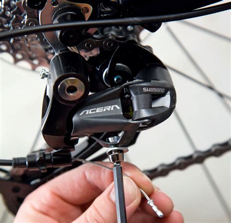 What are the 2 screws on front derailleur?