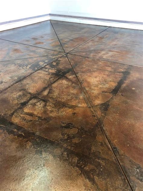 What are the cons of stained concrete?
