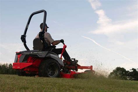 What are the hazards of electric lawn mowers?