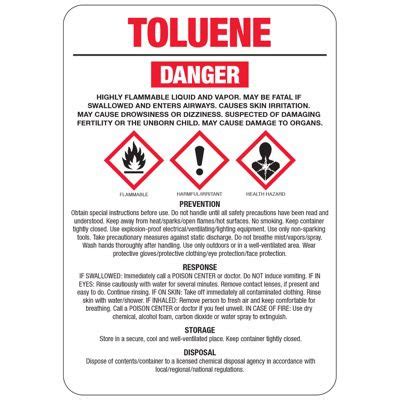 What are the hazards of toluene in a lab?