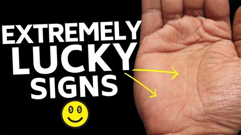 What are the lucky signs on a woman's palm?