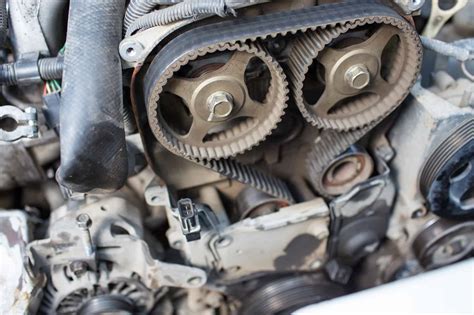 What are the symptoms of a bad timing belt tensioner?
