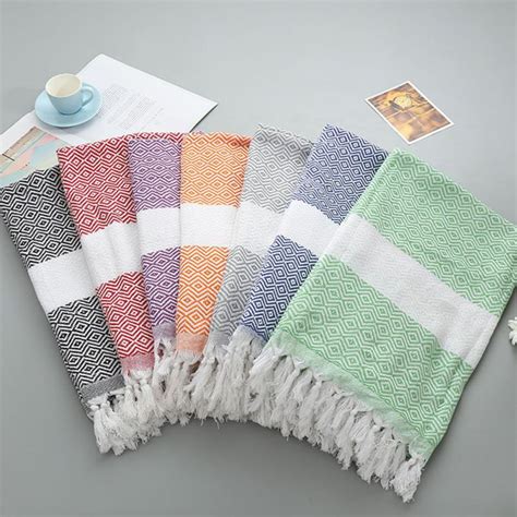 What are the thin beach towels called?